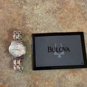 Bulova Woman’s small silver watch